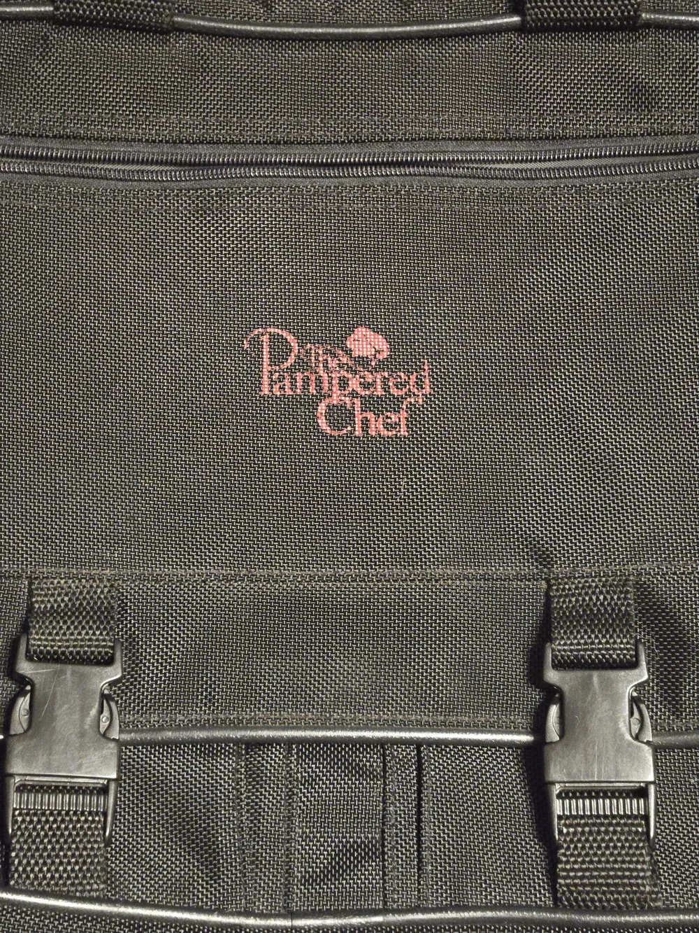 The Pampered Chef Black Serveware Travel Case And Serving Wares.